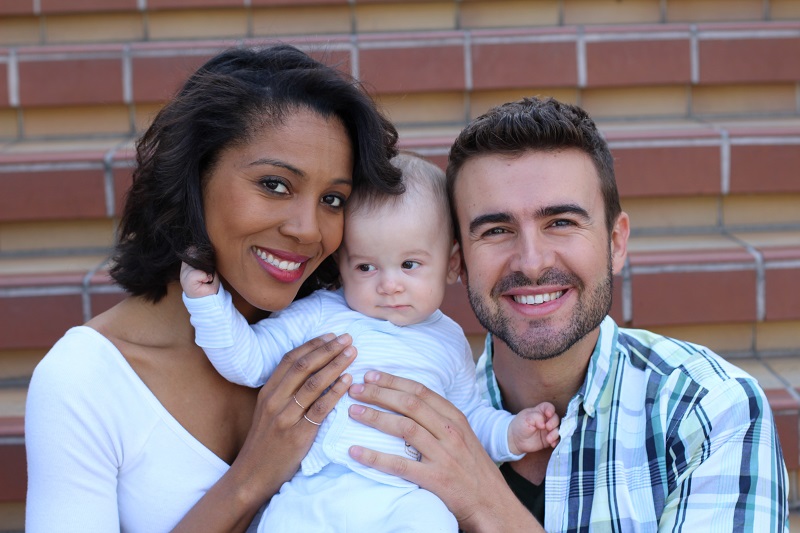 a person and person holding a baby.