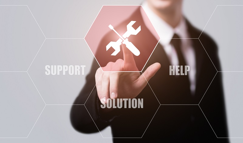 a person touching a screen with a tool icon. Containing the words: support help solution