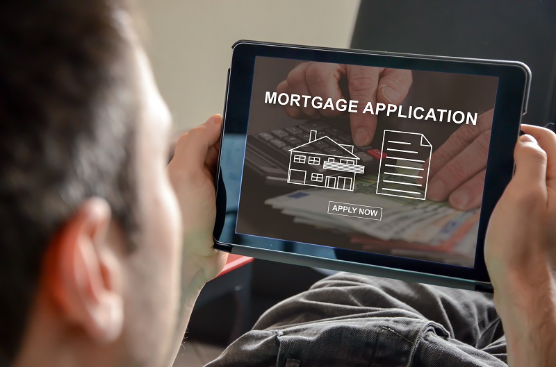 a person looking a mortgage application on a screen