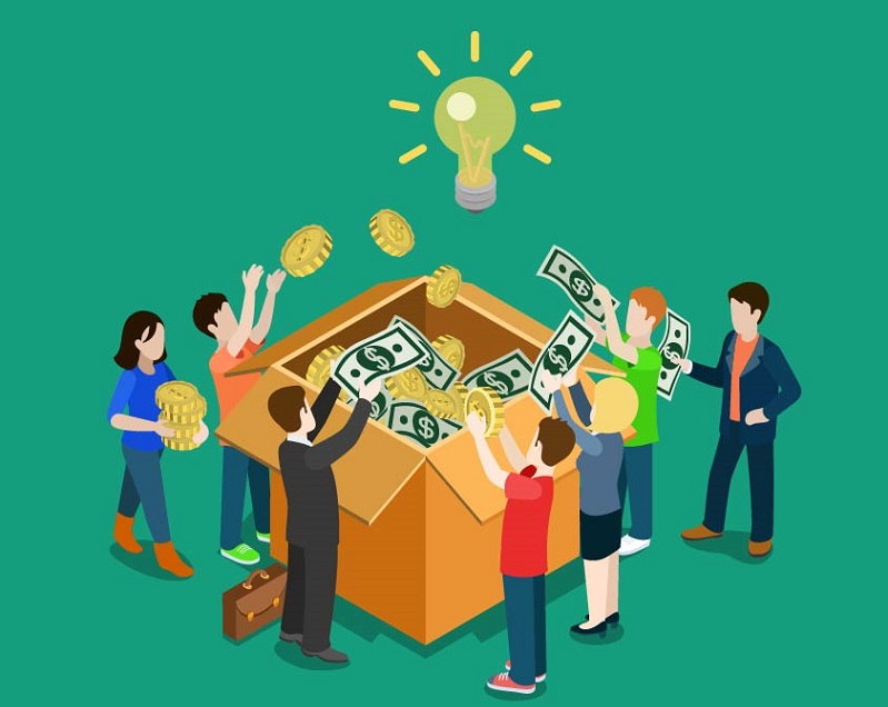 a group of people throwing money into a box.